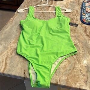 Vibrant Green One-Piece Swimsuit with High-Cut Design
